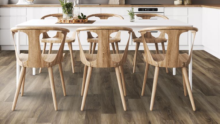 luxury vinyl plank flooring in a white and wood themed kitchen